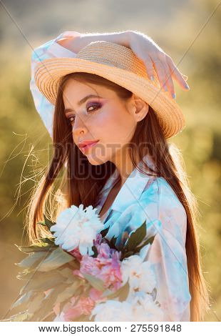 Natural Beauty And Spa Therapy. Flowers. Summer Girl With Long Hair. Face And Skincare. Travel In Su
