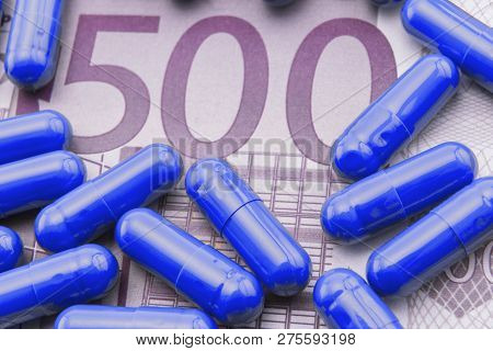 Blue Capsules Up Ticket Of 500 Euros, Concept Of Health Copay