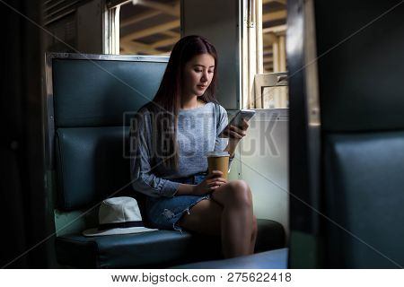 Attractive Beautiful Asia Woman Is Playing Or Searching Some Location That She Want To Go There Duri