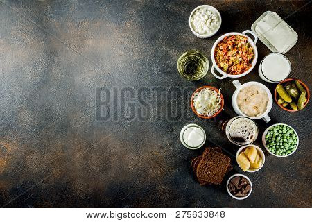 Super Healthy Probiotic Fermented Food Sources, Drinks, Ingredients, On Dark Concrete Background Cop
