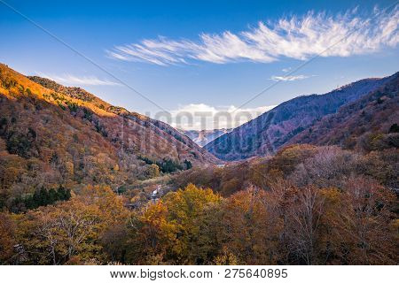 Tanigawadake Mountain Or Mount Tanigawa  With Vibrant Autumn Foliage In Minakami, Japan