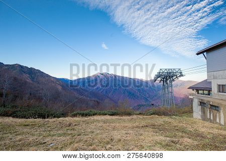 Tanigawadake Mountain Or Mount Tanigawa  With Vibrant Autumn Foliage In Minakami, Japan