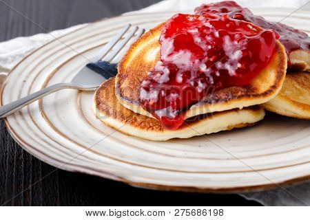 Homemade Pancakes With Berry Sauce Coulis Close Up