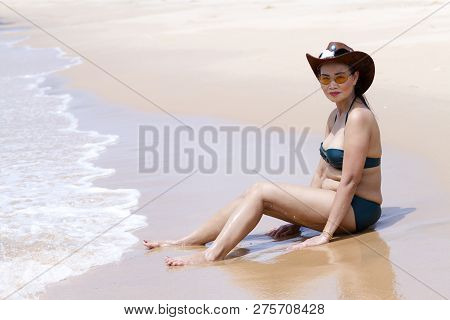 Woman Sexy Bikini Beautiful With Sunshine On Beach At Bang Beot Beach, Chumphon Province Thailand