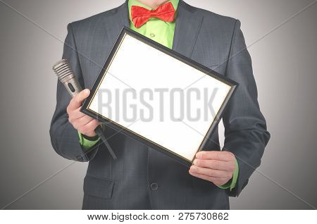 Blank Diploma Or Certificate Mockup In A Presenter Hands. Award Ceremony. Product Presentation. Spec
