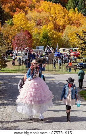 Arrowtown, New Zealand - April 2018: Tourists Flock To Arrowtown For The Akura Arrowtown Autumn Fest