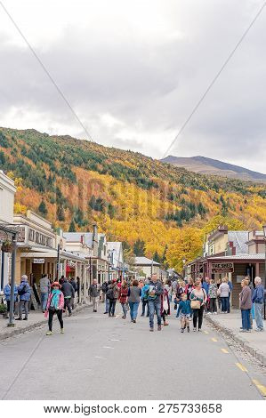 Arrowtown, New Zealand - April 2018: Tourists Flock To Arrowtown For The Akura Arrowtown Autumn Fest