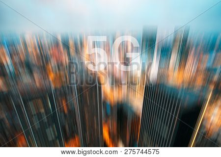 5g On A Motion Blurred City Skyline Illuminated At Dusk