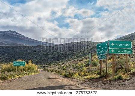 Matjiesrivier, South Africa, August 27, 2018: Directional And Distance Signs At The Start Of The Roa