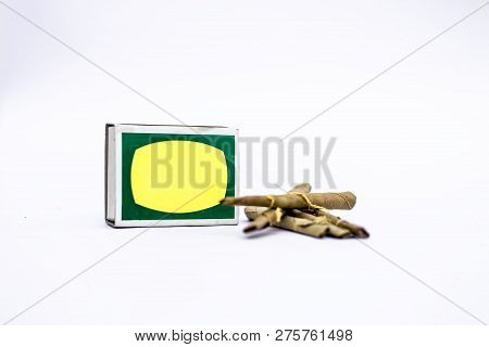 Close Up Of Mini Cigar Or Mini Cigarette Or Bidi Or Beedi Isolated On White With A Matchbox.