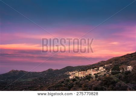 Dramatic Pink And Orange Sunset Over The Mountain Villages Of Costa And Belgodere In The Balagne Reg