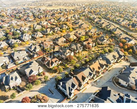 Top View New Development Residential Neighborhood And Urban Sprawl At Morning Fall Light