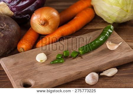 Verious Fresh Vegetables On A Wooden Table, Healthy Food