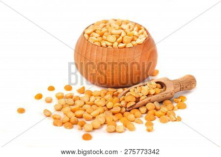 Dry Yellow Peas On Wooden Bowl Isolated On White Background