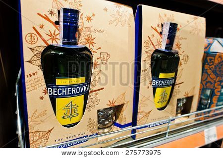 Kyiv, Ukraine - December 19, 2018: Package Bottles Of Becherovka On Shelves In A Supermarket. Becher
