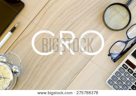 Top View Of Mobile Phone,pen,clock,magnifying Glass,glasses And Calculator On Wooden Background Writ