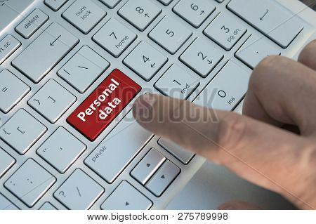 Closed Up Finger On Keyboard With Word Personal Data, Red Button. Inscriptions On The Grey Silver Ke