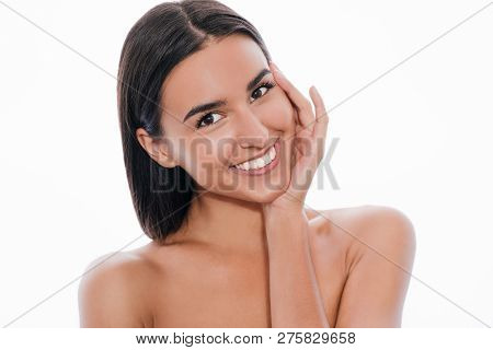 Cute Young Smling Woman Touches Her Clean Skin, On White Background.