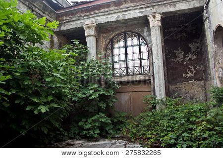 Abandoned Overgrown Interior Of Railway Station In Sukhum, Abkhazia.