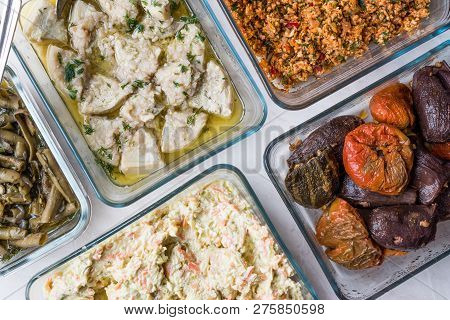 Turkish Food With Olive Oil Kisir, Dolma, Artichoke, Broad Beans And Carrot Salad With Yogurt.