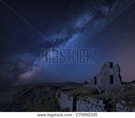 Stunning Vibrant Milky Way Composite Image Over Abandoned Foggintor Quarry In Dartmoor With Raking S