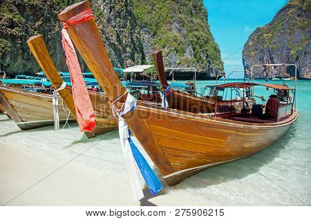 Long Tail Boats In The Maya Bay Of Ko Phi Phi Island Thailand