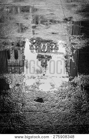 Reflection Of The Cathedral Of Santiago De Compostela In A Rainny Autumn Morning. Black And White.