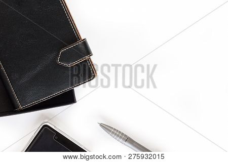 Leather Closed Two Notebooks With Clips With Orange Stitch On Edges Half Seen Put Diagonally, Mobile