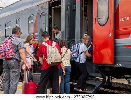 Voronezh, Russia - August 05, 2018: Passengers Boarding The Train At The Intermediate Station