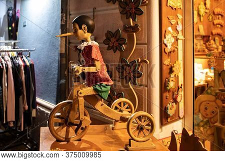 Cesenatico, Emilia Romagna, Italy - Sept 9 2019:  Painted Wooden Marionette Dolls Of The Figure Of P