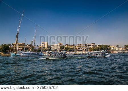 Luxor, Egypt - Jan 28, 2020:The touristic boats on Nile river in Luxor city, Egypt