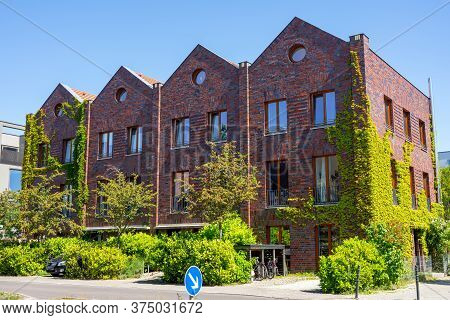 Serial Houses Made Of Red Bricks Seen In Berlin, Germany