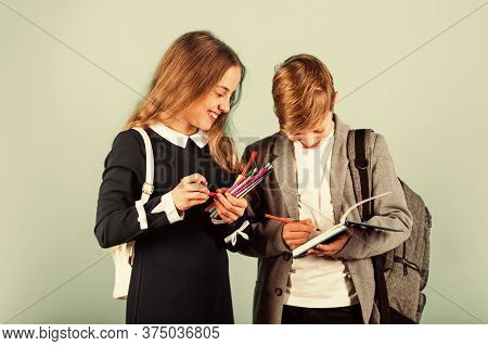 Before Examination. Small Children Prepare For Examination. Little Girl And Boy Hold Examination Pap