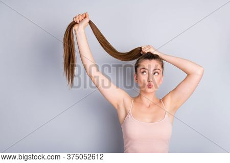 Photo Of Attractive Overjoyed Lady Demonstrate Ideal Long Healthy Hairstyle Raise Amazing Unbelievab