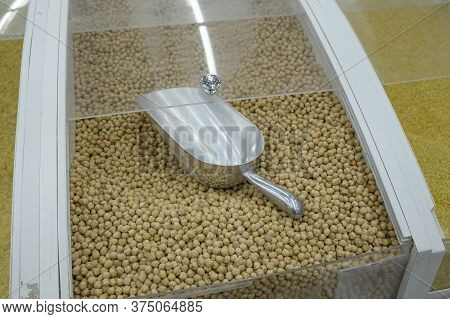 Chickpeas By Weight In A Package In A Supermarket, Legumes On A Store Counter