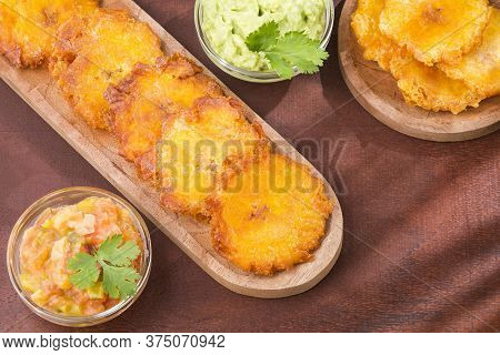 Patacón Fried Flattened Pieces Of Green Plantain (tostón, Tachino)