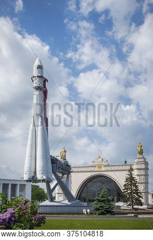 Vostok Rocket Model On The Background Of The Cosmos Pavilion. Exhibition Vdnh,