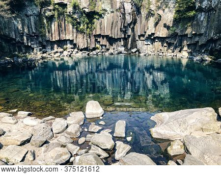 Mountain Lake With Stones In Jeju Island. South Korea