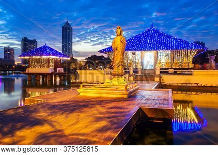 Seema Malaka Buddhist Temple In The Beira Lake In Colombo, Sri Lanka At Sunset. Seema Malaka Is A Pa