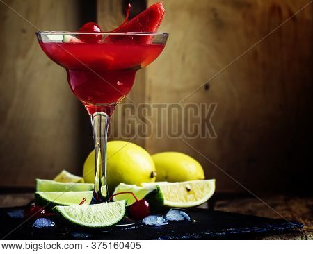 Alcoholic Cocktail With Watermelon, Lemon, Lime, Tequila And Ice, Black Background, Selective Focus