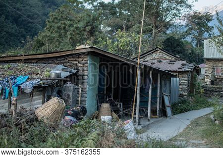 A Woman Working Outside Her Tea House In Ngadi, Nepal