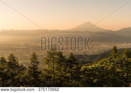 Mt.fuji And Kofu City With Sunrise Sky Seen From Mt. Amariyama View Point.