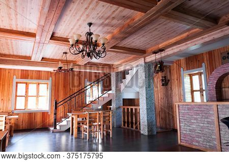 China, Heihe, July 2019: Interior Of A Wooden Bar At Home In A Russian Village Outside The City Of H
