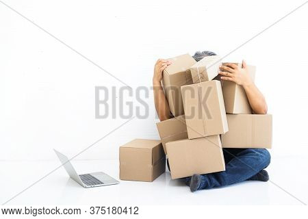 Entrepreneurs Do Business Online, Deliver Products By Mail Sitting Stressful With The Product Pile T