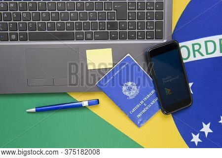 Florianopolis, Brazil, June 27, 2020: Top View Of Cell Phone With The Brazilian Emergency Aid Applic