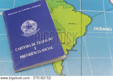Florianopolis, Brazil. June 27, 2020: Top View Of Brazil's Work Card On A Map With Focus On The Sout