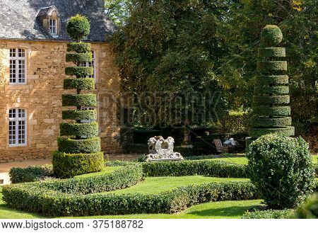 Eyrignac, France - September 2, 2018: The Picturesque Jardins Du Manoir D Eyrignac In Dordogne. Fran
