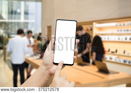 Mockup Smartphone Hand Holding The Black Smartphone With Blank White Screen And Modern Frame Less De