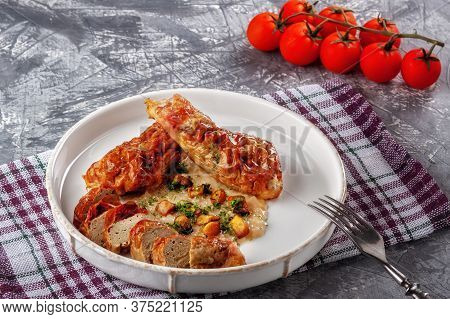 Chicken Drumstick Ballotin With Onion Sauce And Mushrooms. Stuffed Chicken Legs