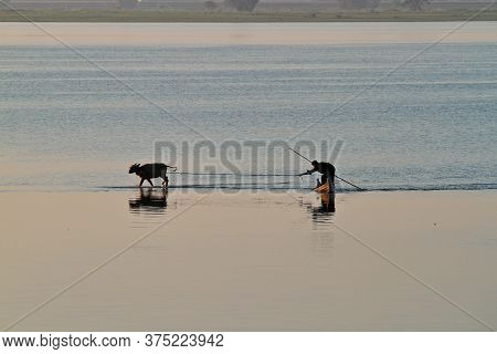 Mandalay, Myanmar - Nov 12, 2019: Fishermen Near U Bein Bridge In Amarapura,mandalay Myanmar